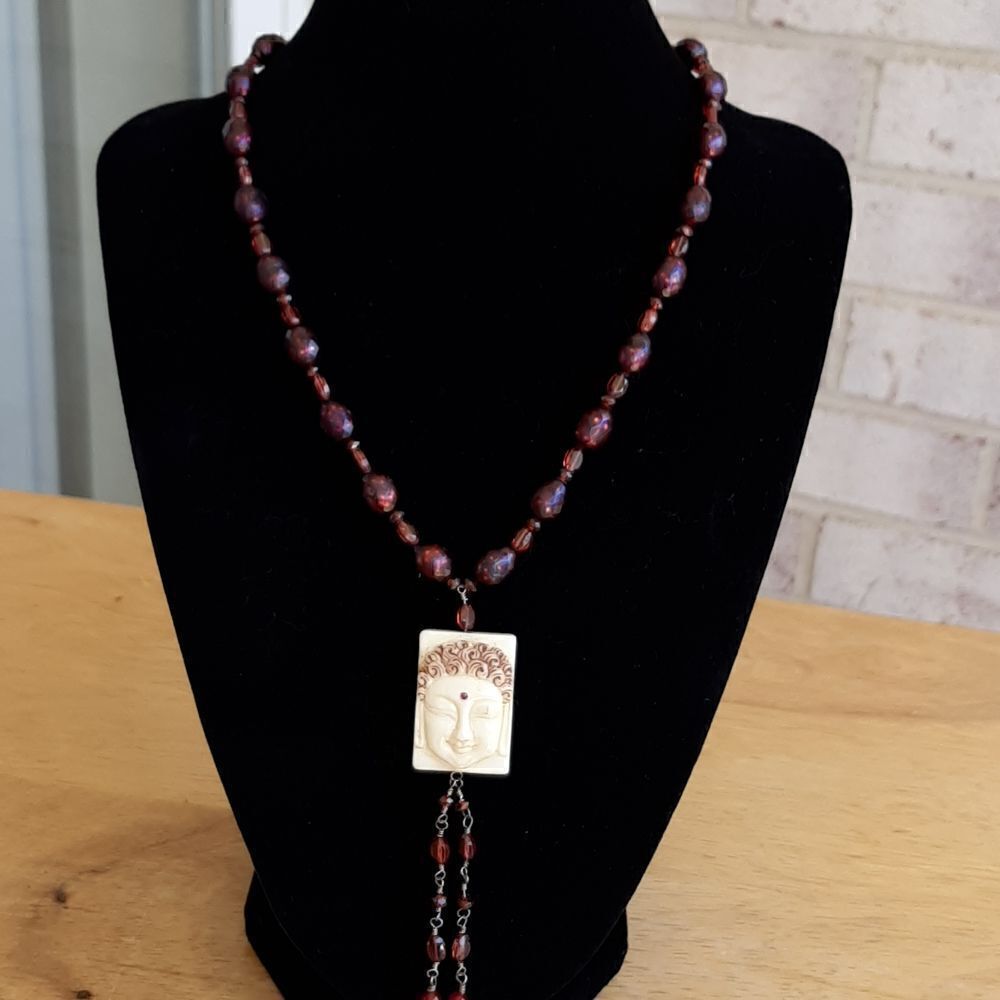 Artisan carter Wells purple beaded necklace with bone pendant